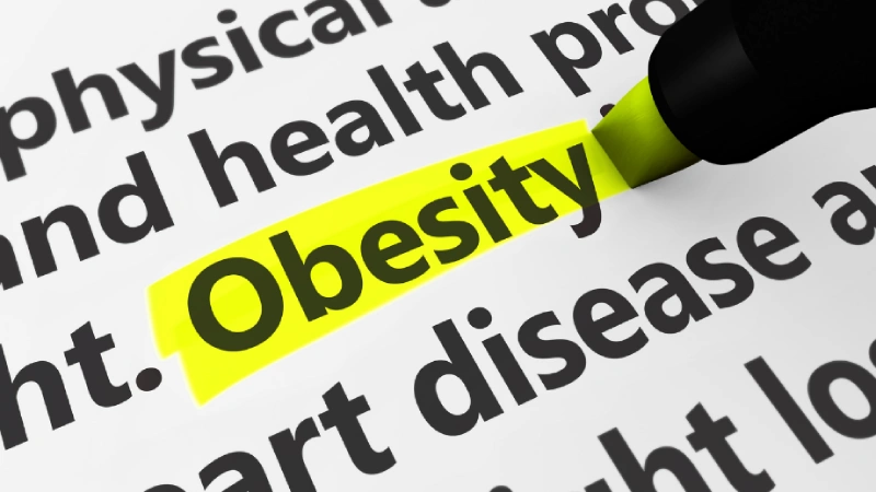 Obezite Ameliyatı Fiyatları - 2023- üstü sarı ile çizilmiş obezite yazısı